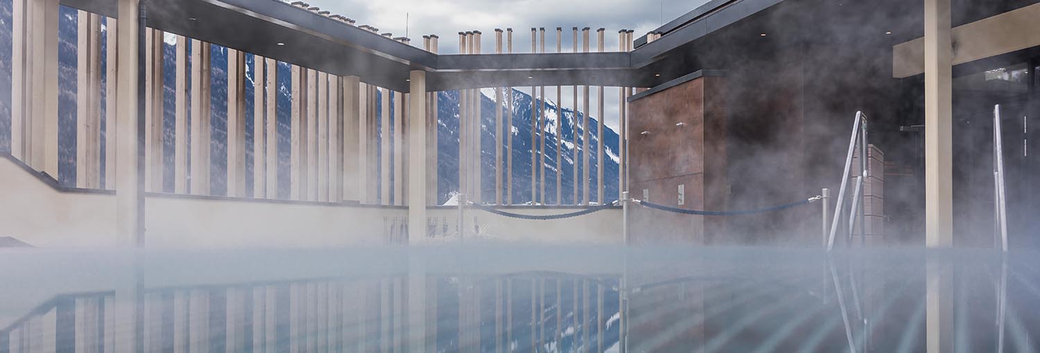 winter-telferbad-aussenpool-sauna-slider